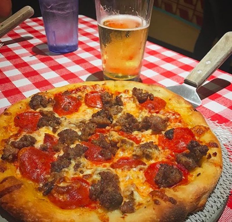 A pizza and beer served at Bill's Pizza in Palm Springs, California 