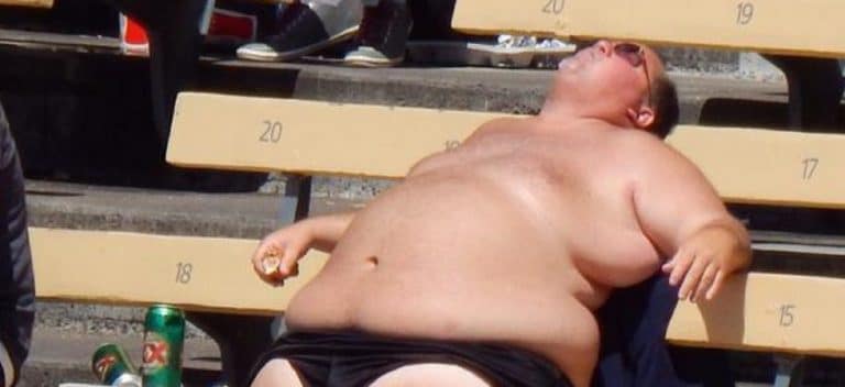 Large, Shirtless Man Shows Off at Dodger Game