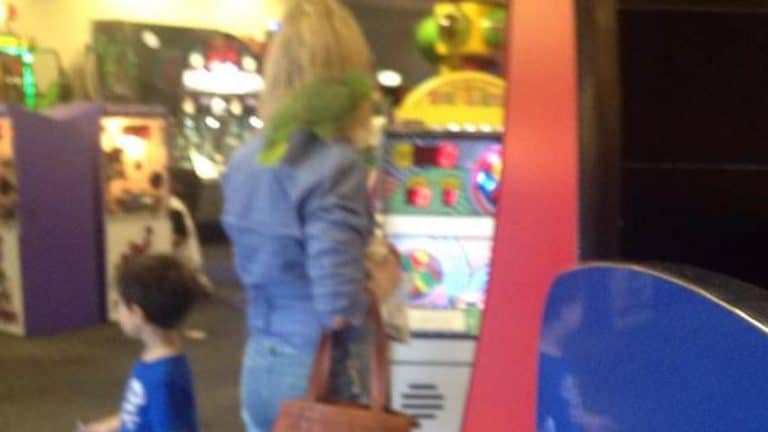 Lady Takes Her Bird to Palm Desert Chuck E. Cheese’s