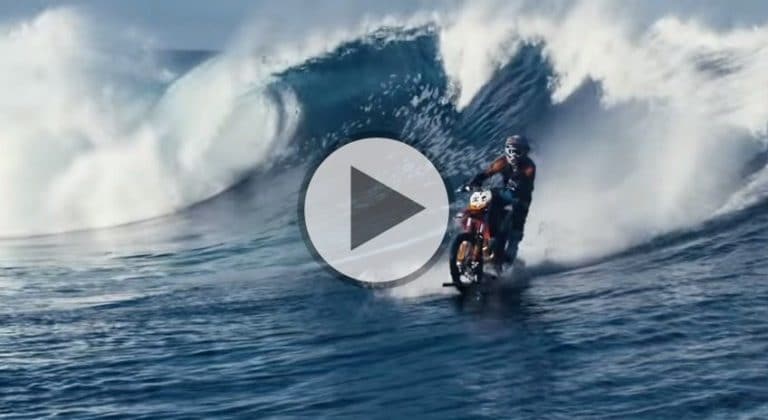 Watch Incredible Video of a Daredevil Surf on His Dirt Bike.  (Yes, You Read That Right)