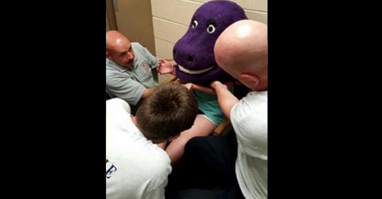 Fire department rescues teen from stuck Barney head after failed prank