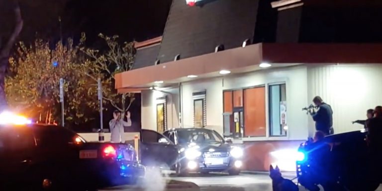 Video: Cop arrested after pulling gun on Jack in the Box employee