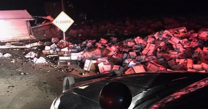 A bunch of Michelob Ultra boxes were destroyed after a truck slid on black ice. (Inyo Sheriff's Department / Facebook)