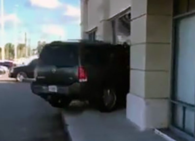 Video: Furious customer crashes her SUV into T-Mobile store