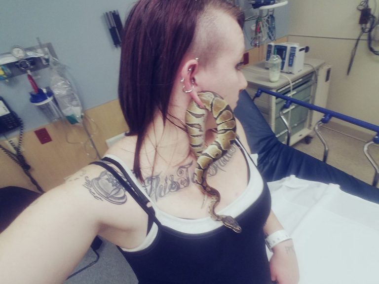 Yup, that’s a snake stuck in that lady’s ear