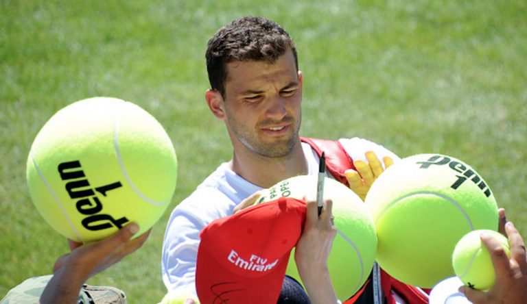 Please play one tennis match with these giant balls