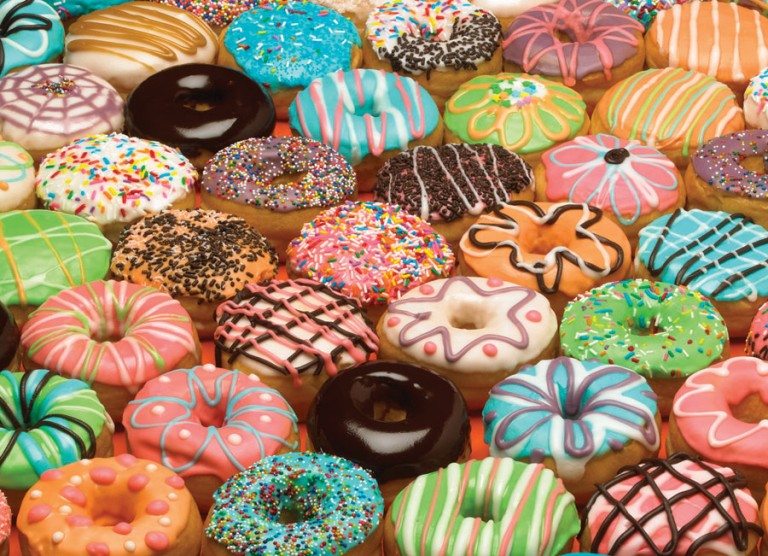 Customers are buying dozens of doughnuts so a shop owner can be with his sick wife