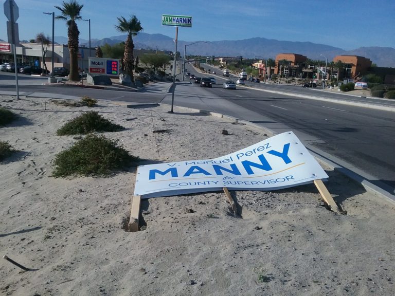 Manny Perez is not happy that his signs are being knocked down and stolen