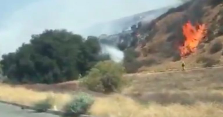 Fire breaks out just off 60 Freeway in the Badlands