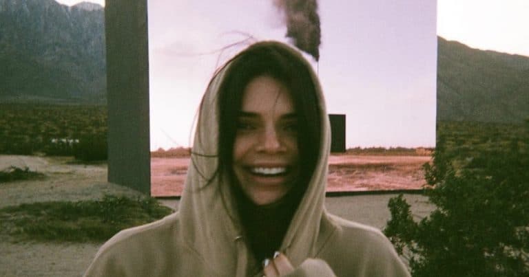 Here’s Kendall Jenner standing directly in front of ‘Western Flag’ in Palm Springs