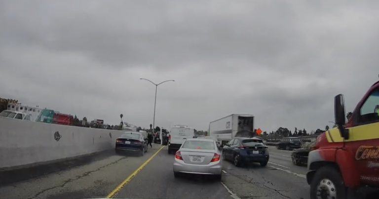 Drivers stop on California freeway after family throws cash to honor dead loved one