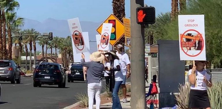 Rancho Mirage residents take to the street to protest In-N-Out Burger