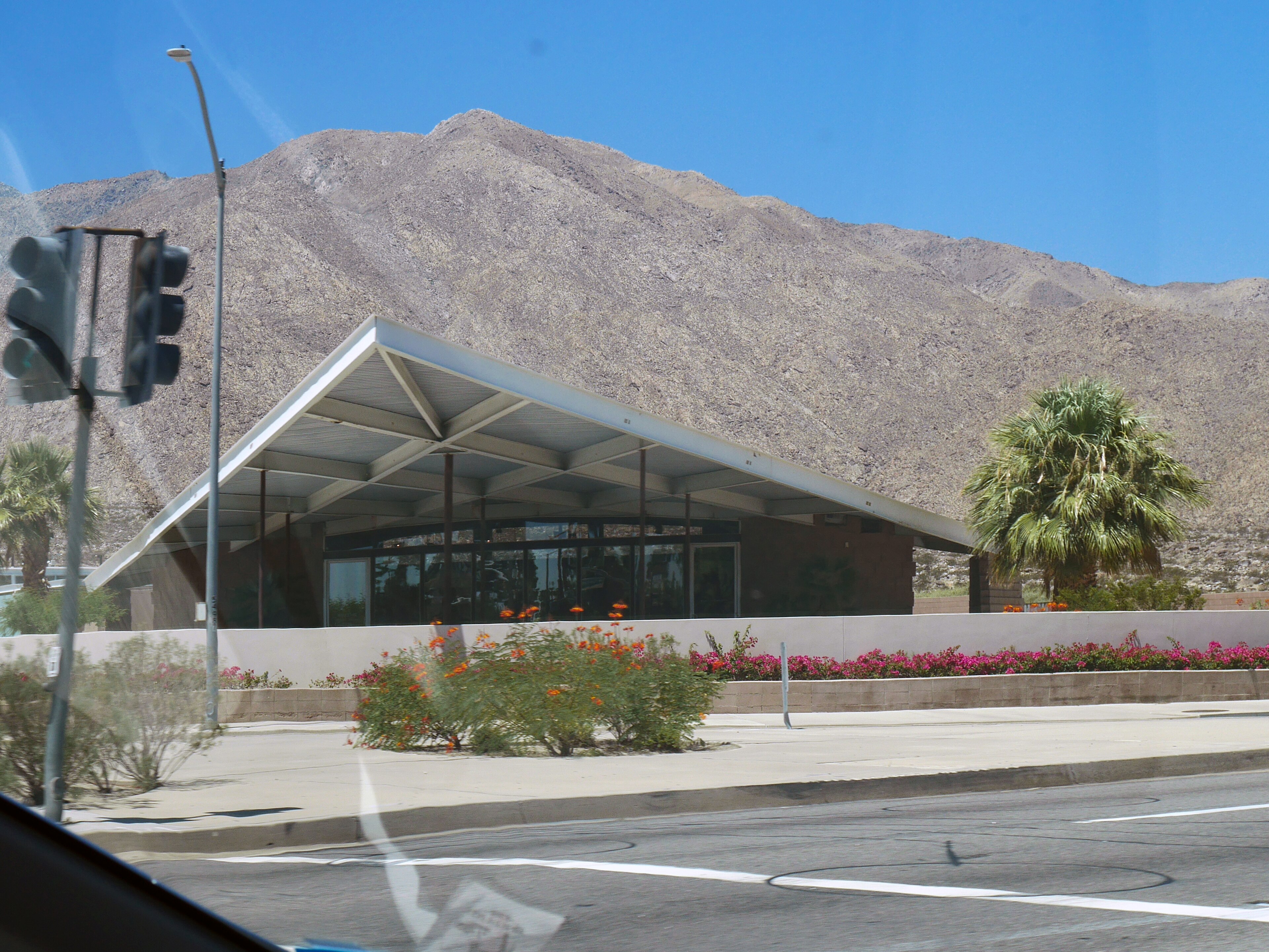 The midcentury modern Tramway Gas Station building, now the Palm Springs Visitor Center, in Palm Springs, California